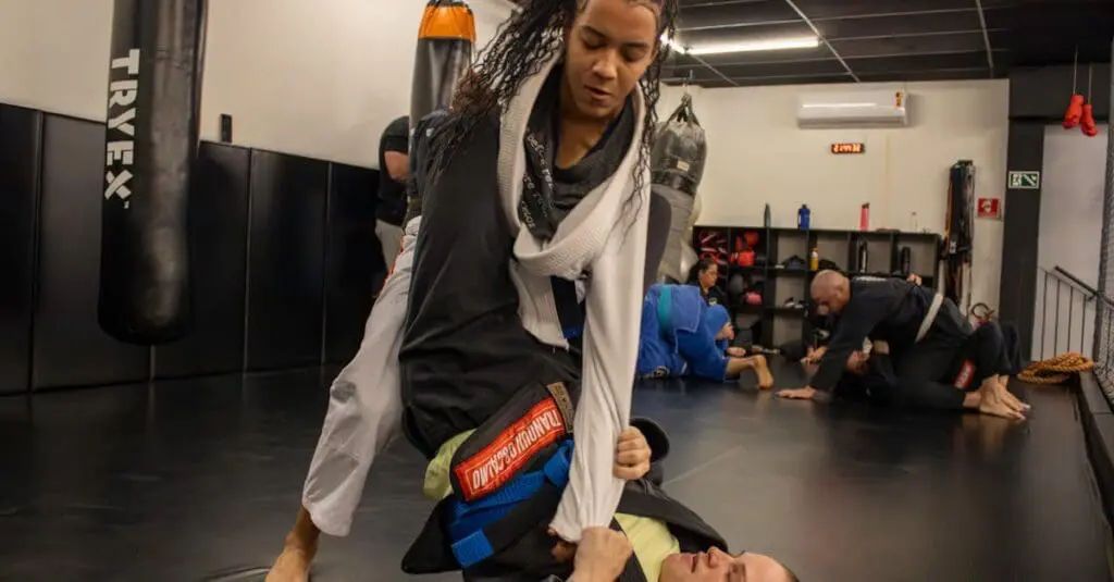 Student practicing sleeve control during beginner Jiu Jitsu training